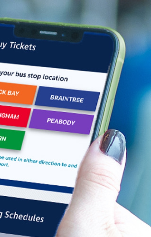 Person holding a phone with ticket page open