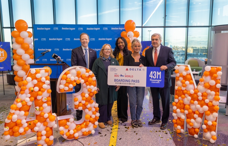 “Massport CEO Rich Davey, MassDOT Undersecretary Hayes Morrison, Delta Air Lines Candice Stover, 43 Millionth passenger Reagan Berry, and Massport Director of Aviation Ed Freni celebrate the busiest year at Boston Logan International Airport.”