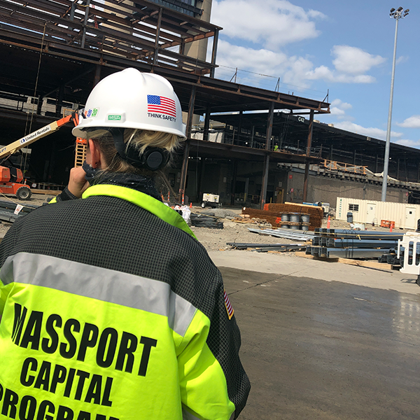 Capital Programs manager surveys construction at Logan