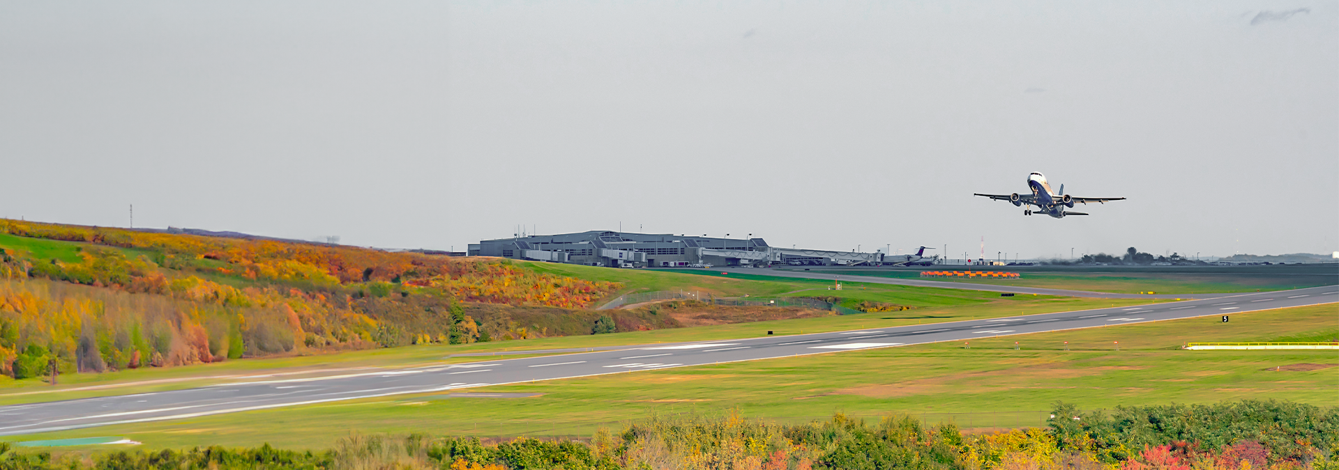 Plane taking off at Worcester Regional airport