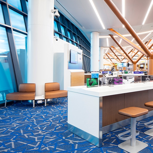 Chairs and desks in waiting area at airport