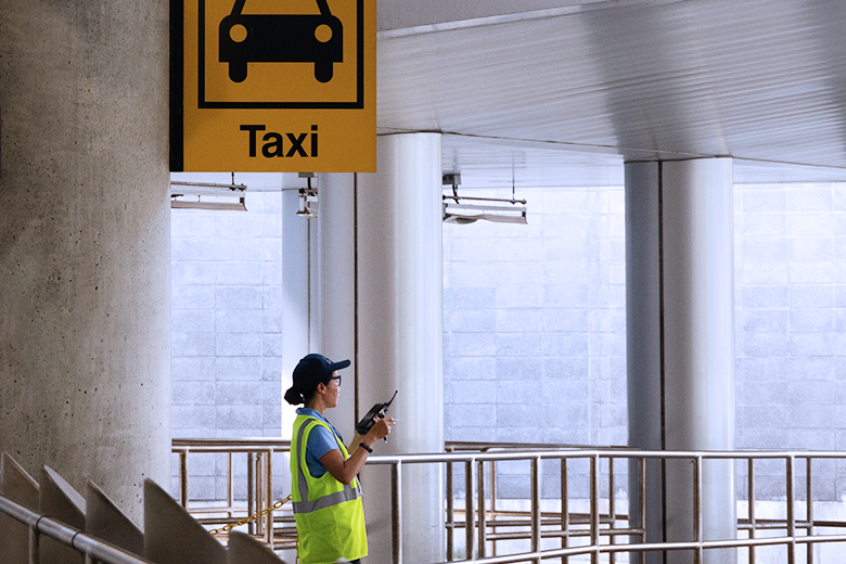 Taxi attendant working at Boston Logan