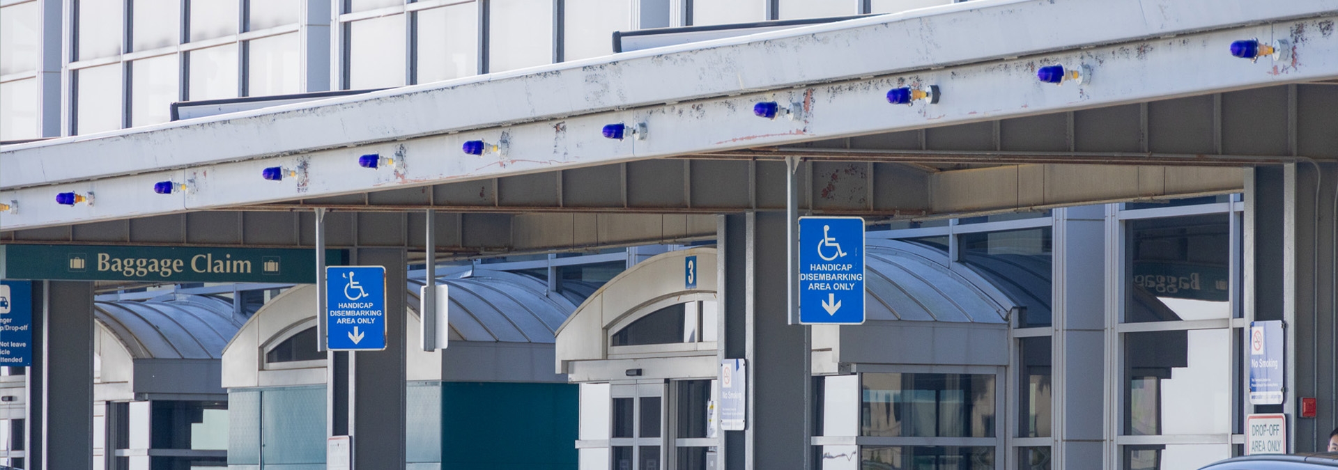 Handicap drop off signage at terminal