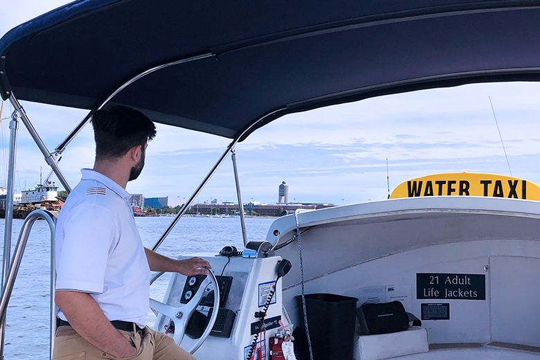 Man driving water taxi