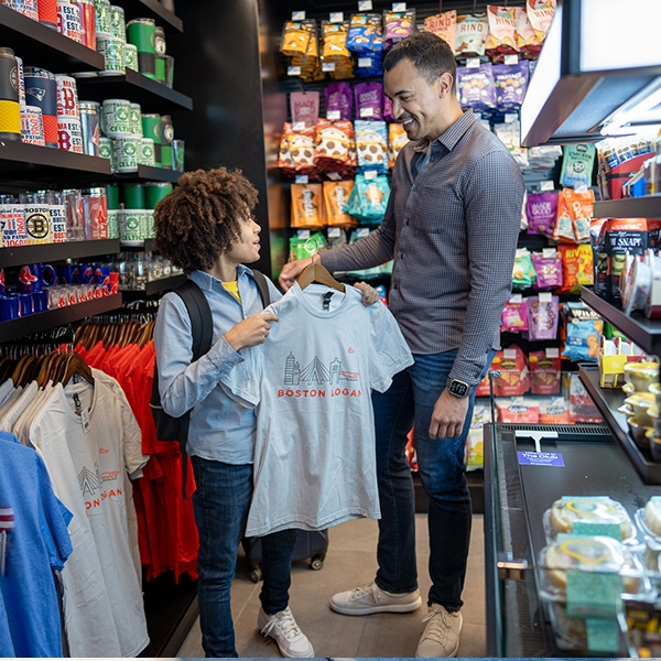 Father and son shopping at Boston Logan