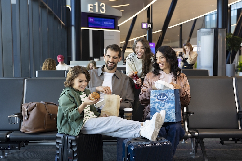 Family sitting in terminal E
