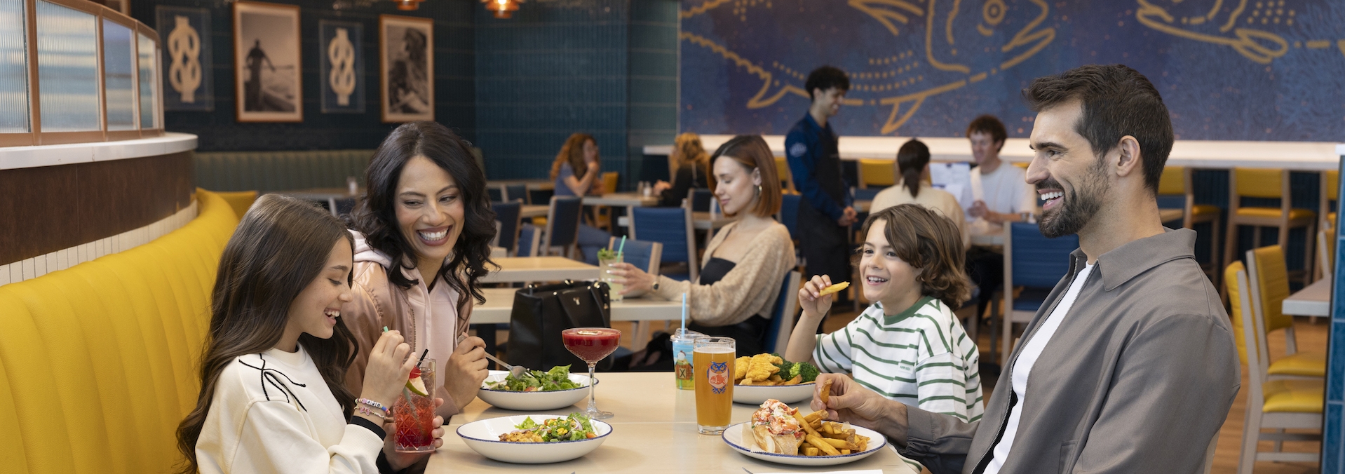 Family sitting at table and eating