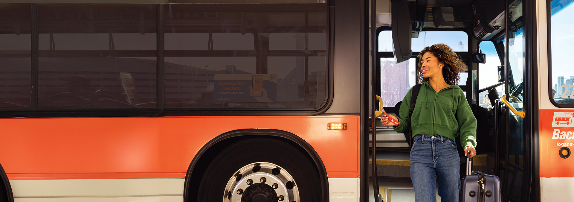 women getting off Back Bay Logan Express Bus