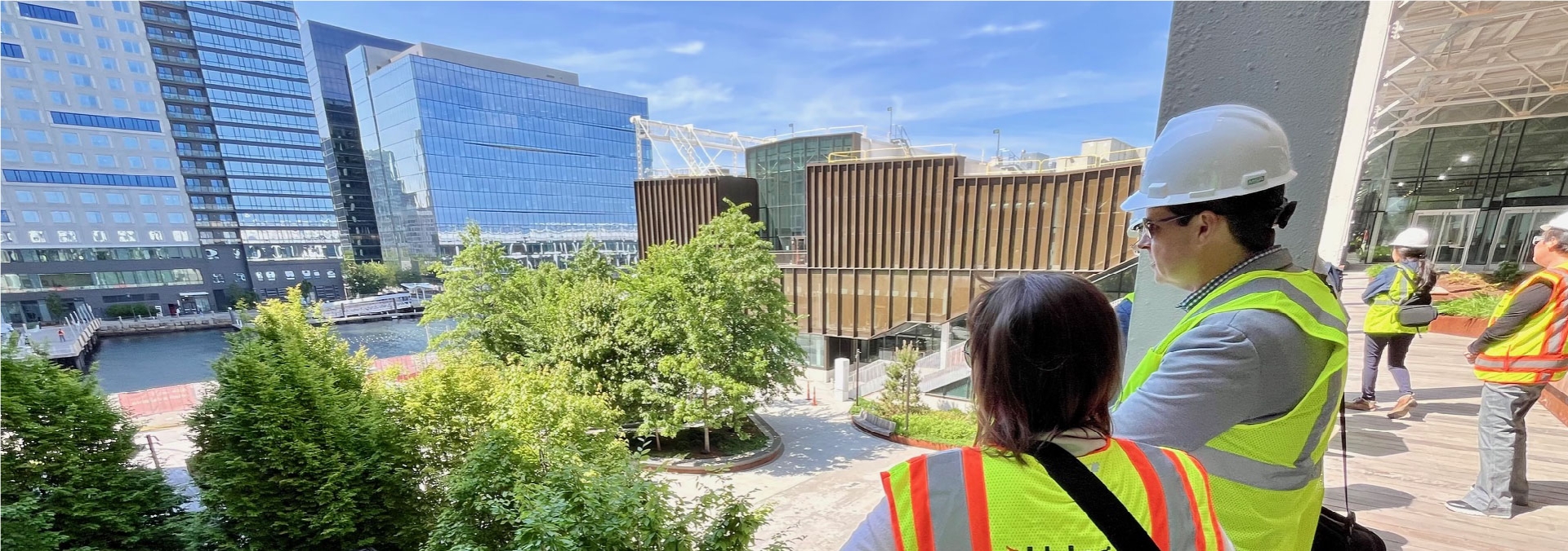 Construction workers observing construction site