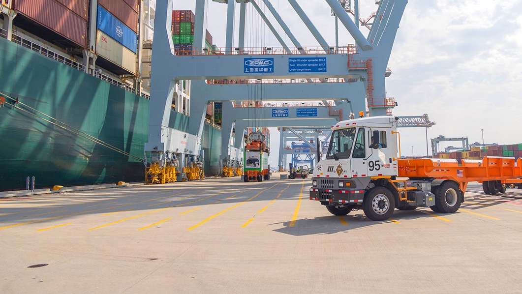 Truck next to cargo ship at Conley Terminal