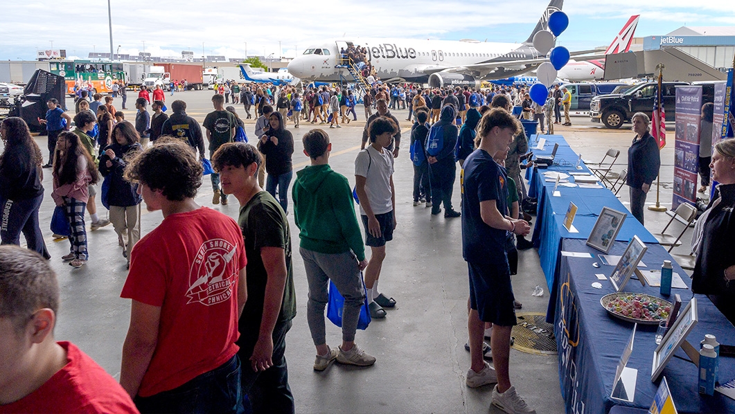 Kids learning about aviation at annual STEM Expo