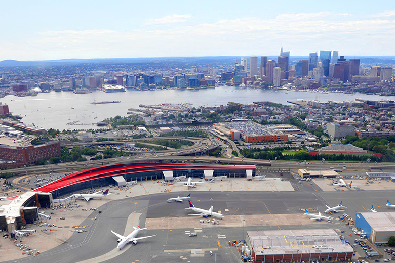 Boston Logan International Airport Terminal E with Boston Skyline in the background