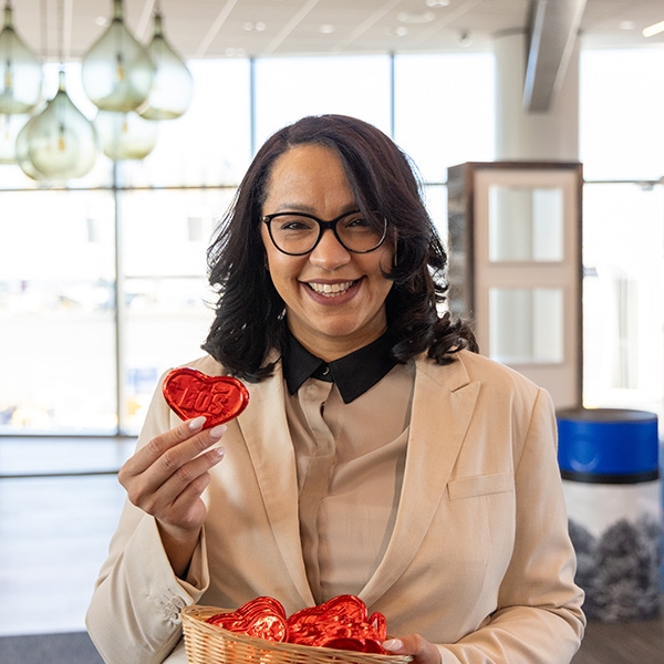 Customer Service Team handing out heart chocolates
