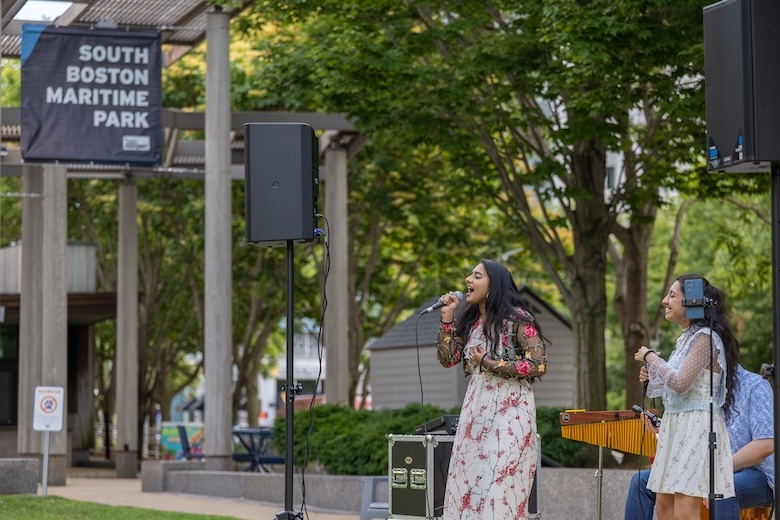 Women singing in park