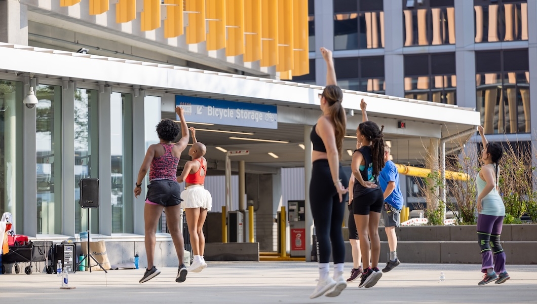 Women working out in plaza