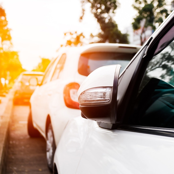 Cars parked along a curb